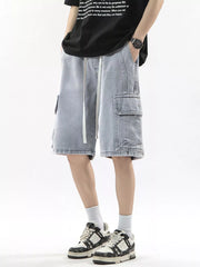 Men's light wash denim cargo shorts with drawstring and multiple pockets.