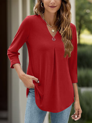 Deep Red V-neck three-quarter sleeve top with pleats and a decorative button.