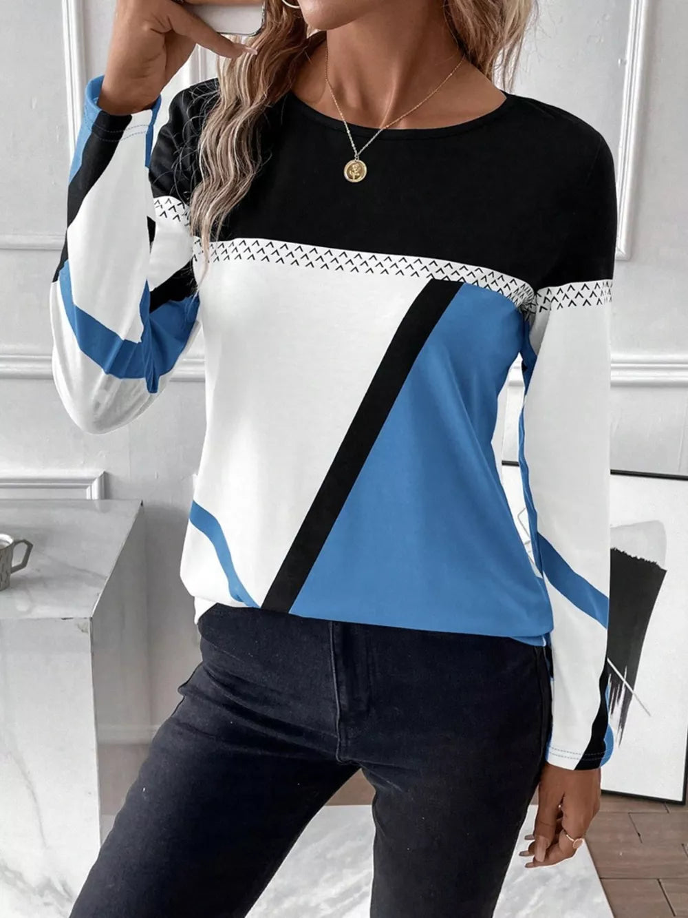 Geometric panel long sleeve t-shirt in black, white, and sky blue with chevron detail