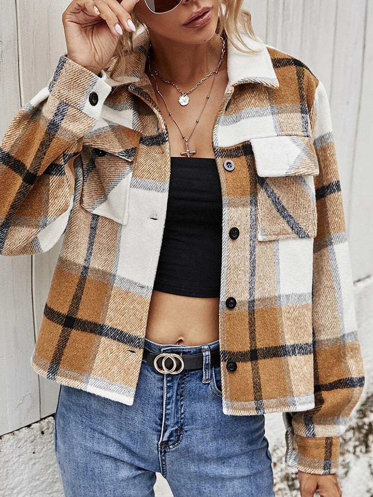 Camel plaid shacket with contrast collar, buttoned front, and chest pockets.