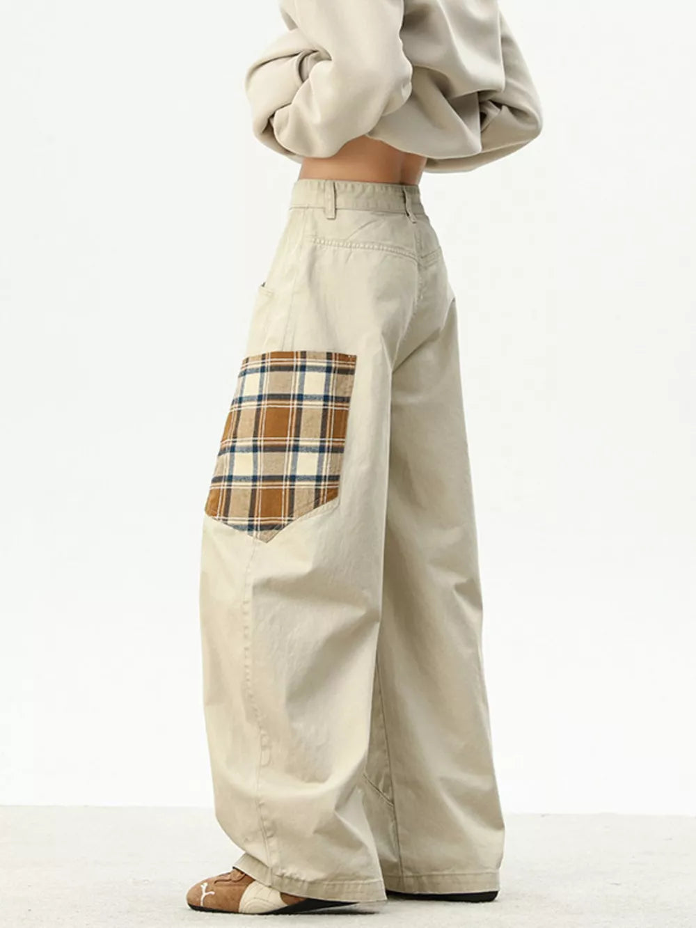 Apricot wide-leg sweatpants with plaid patchwork detail