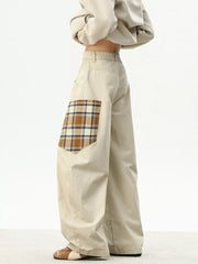 Apricot wide-leg sweatpants with plaid patchwork detail