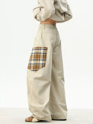 Apricot wide-leg sweatpants with plaid patchwork detail