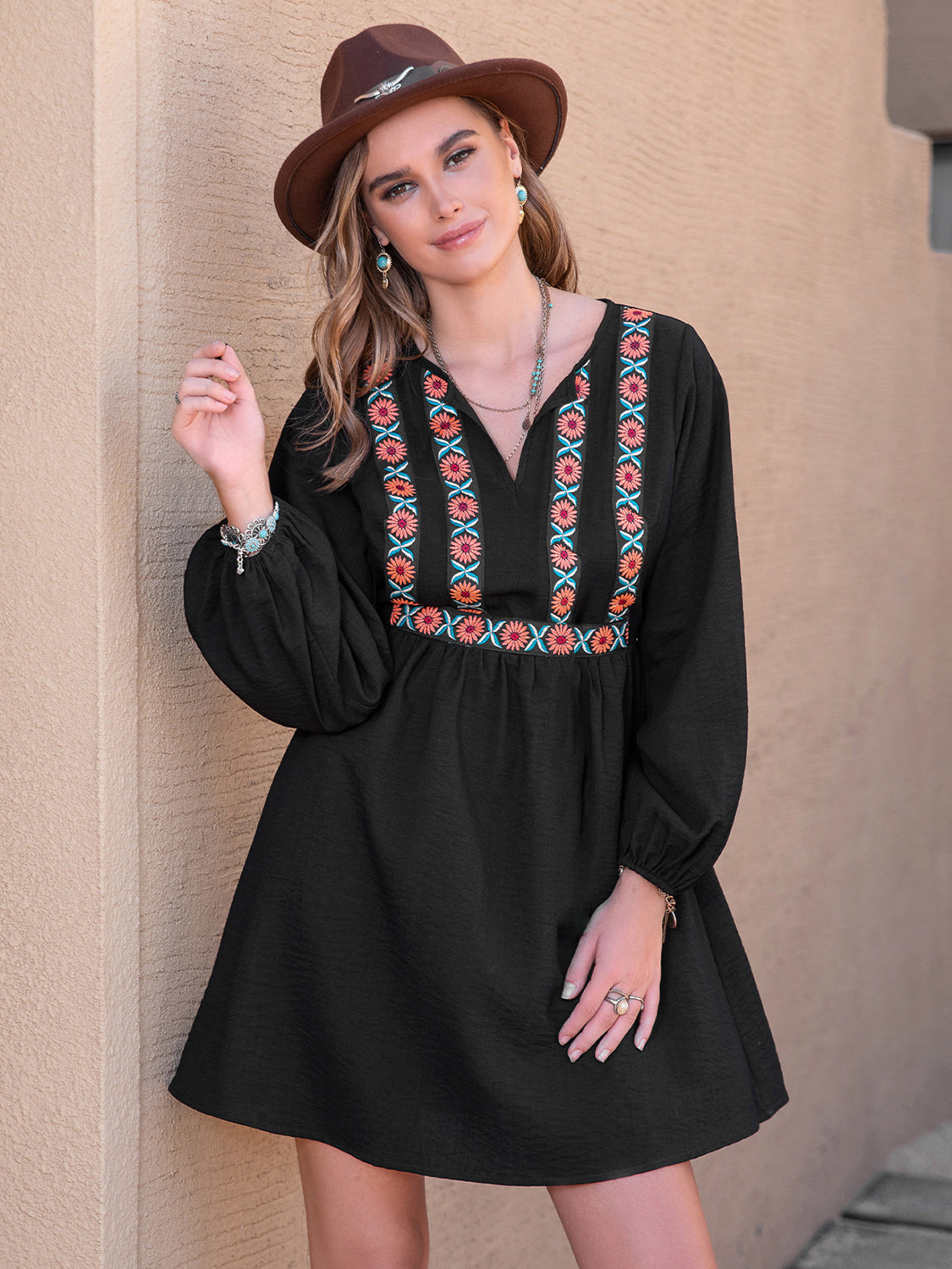Black mini dress with embroidered yoke and balloon sleeves
