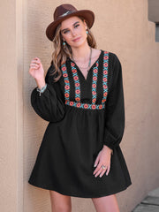 Black mini dress with embroidered yoke and balloon sleeves