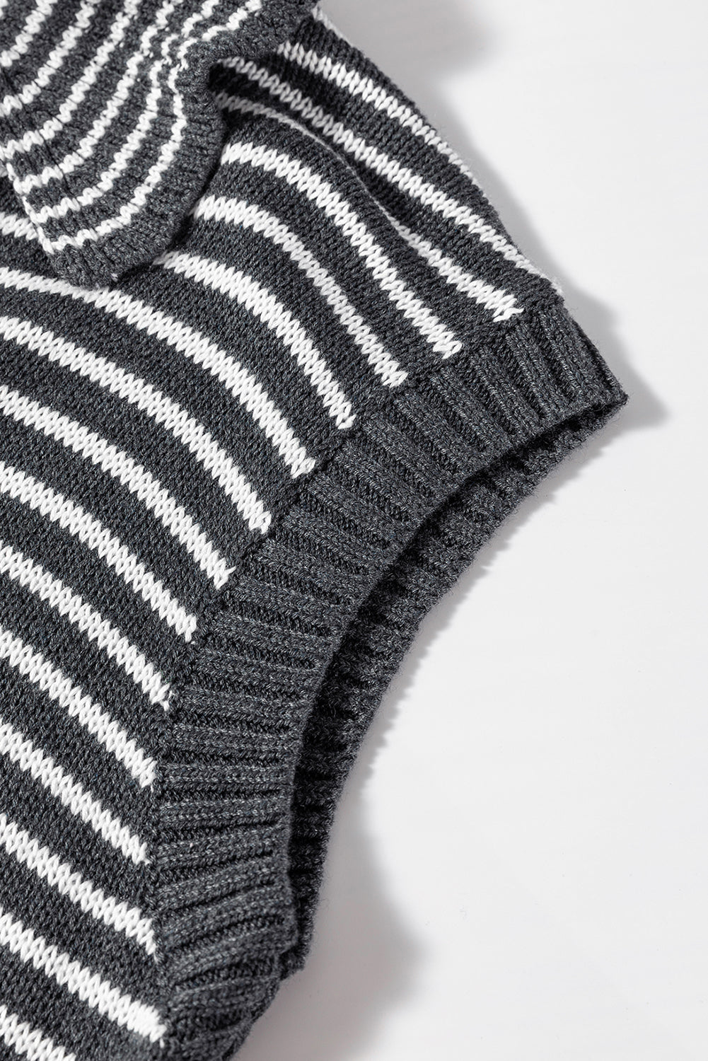 Gray striped knit polo vest with a mock neck and ribbed trim.