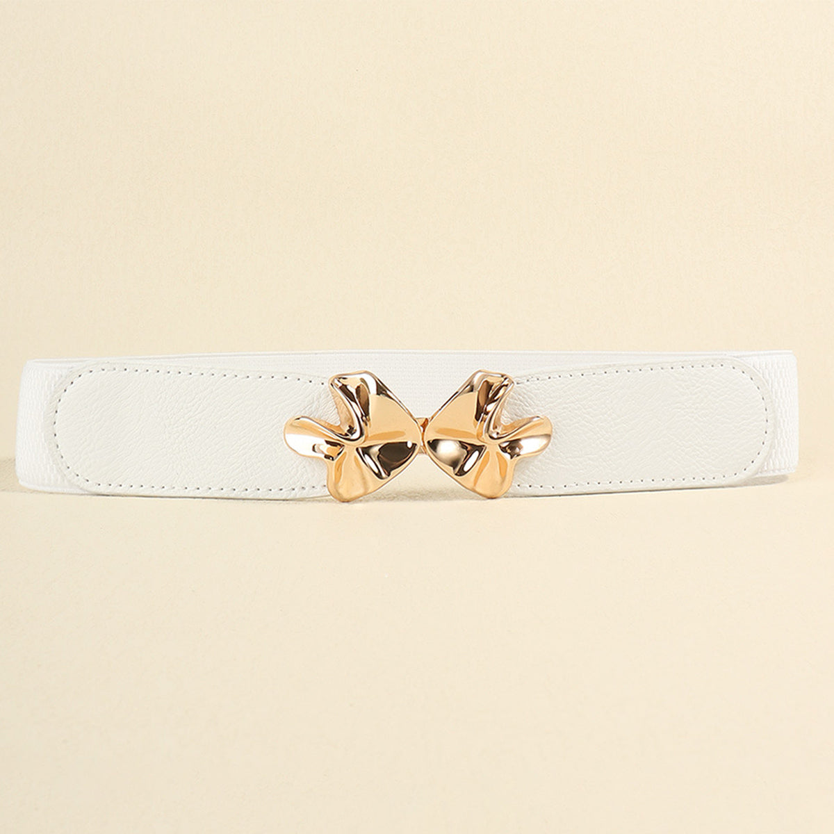Ivory elasticated waist belt with gold bow clasp detail