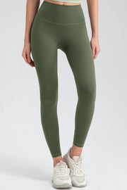 Green high rise leggings with a seamless waistband and ankle length