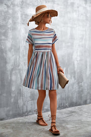 Striped yoke-seam trapeze dress with short sleeves and a round neckline.