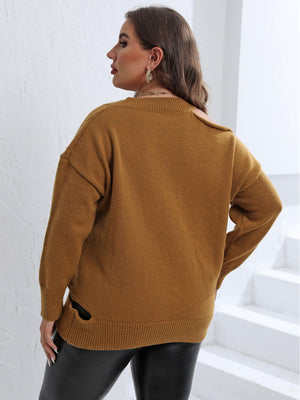 Caramel knit sweater with asymmetric shoulder detail and side slit.