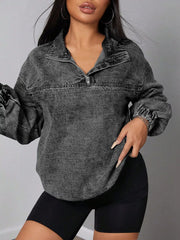 Chic quarter-zip acid wash denim top with elastic hem and collar.