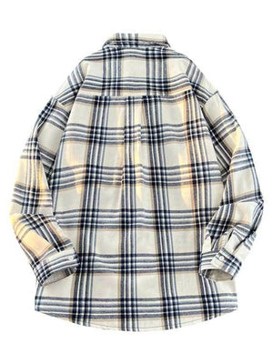 Vintage oversized plaid button-up shirt in cream with navy and white plaid pattern.