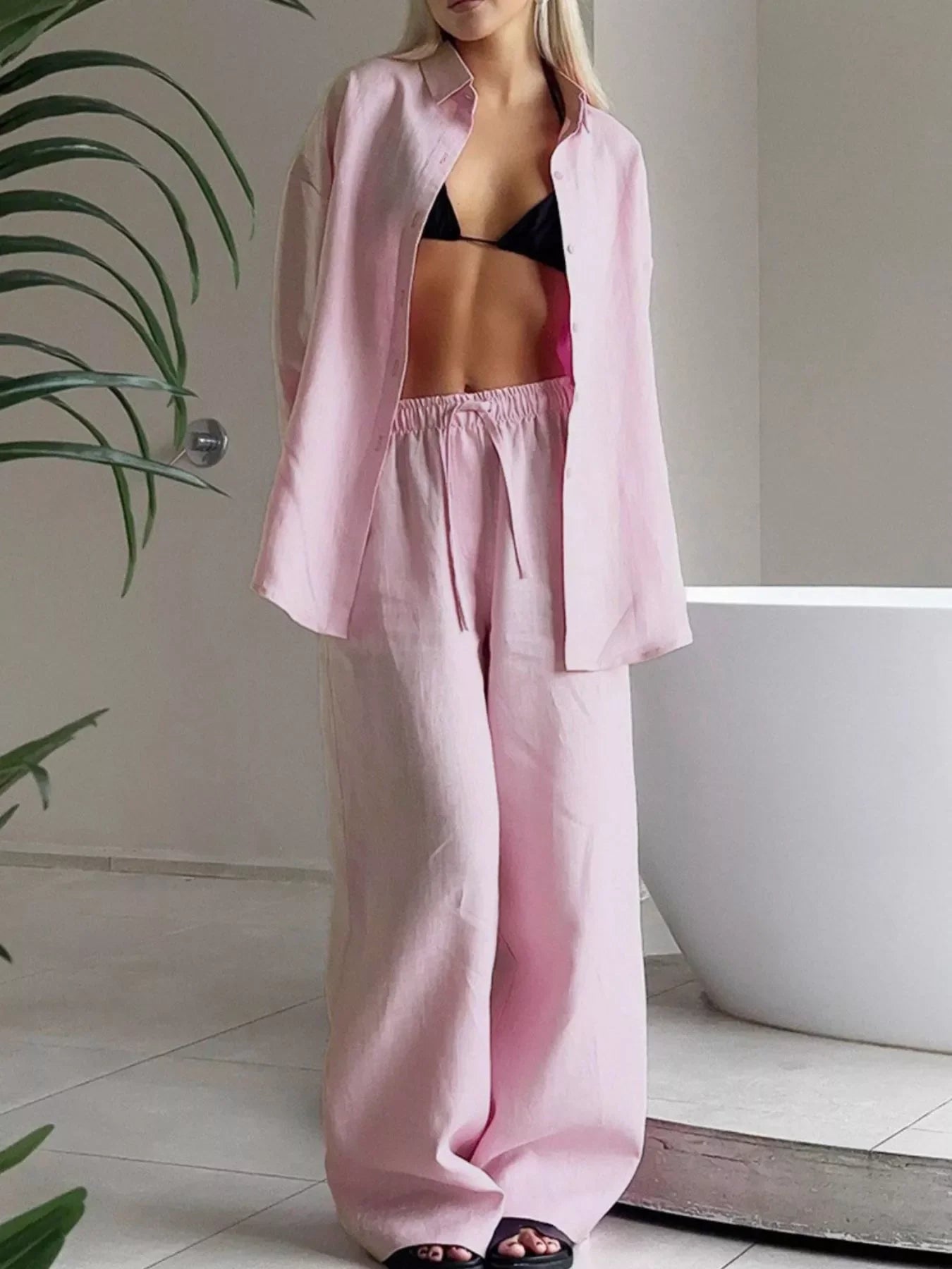 Pink relaxed fit button-up shirt and wide-leg pants set with drawstring waist