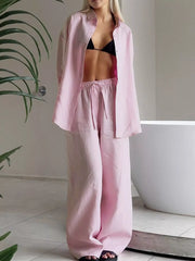 Pink relaxed fit button-up shirt and wide-leg pants set with drawstring waist