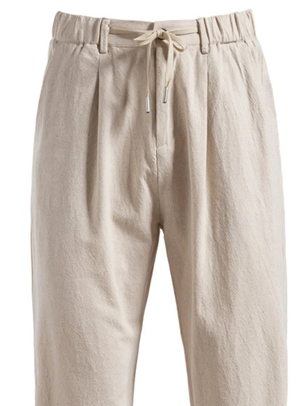 Beige linen drawstring trousers with pleats and elastic waistband.