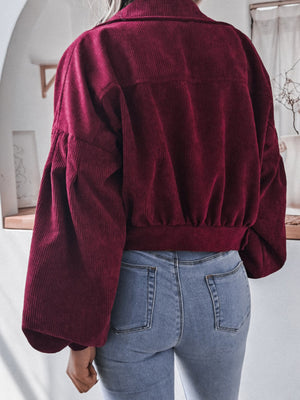 Wine corduroy cropped jacket with balloon sleeves and button-up front.