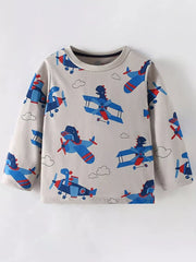 Toddler long sleeve t-shirt in beige with a playful all-over print of blue and red cartoon airplanes and clouds.
