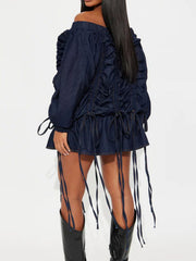 Dark navy denim off-shoulder dress with ruched back and drawstring hem.