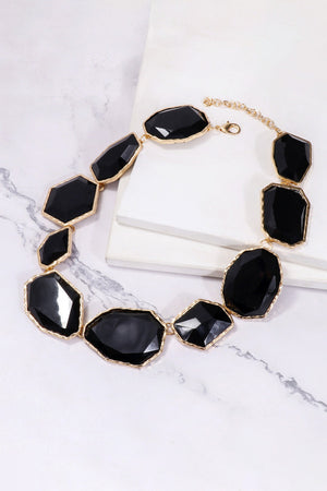 Black resin stone collar necklace with gold-tone alloy chain and clasp.