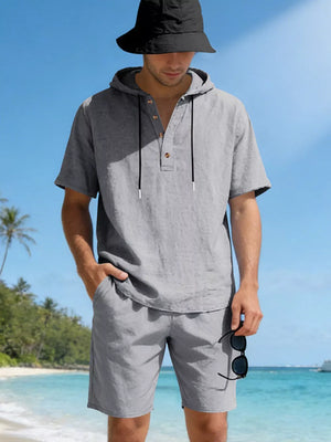 Men's gray linen blend hooded top and shorts set with drawstring hood and button placket.