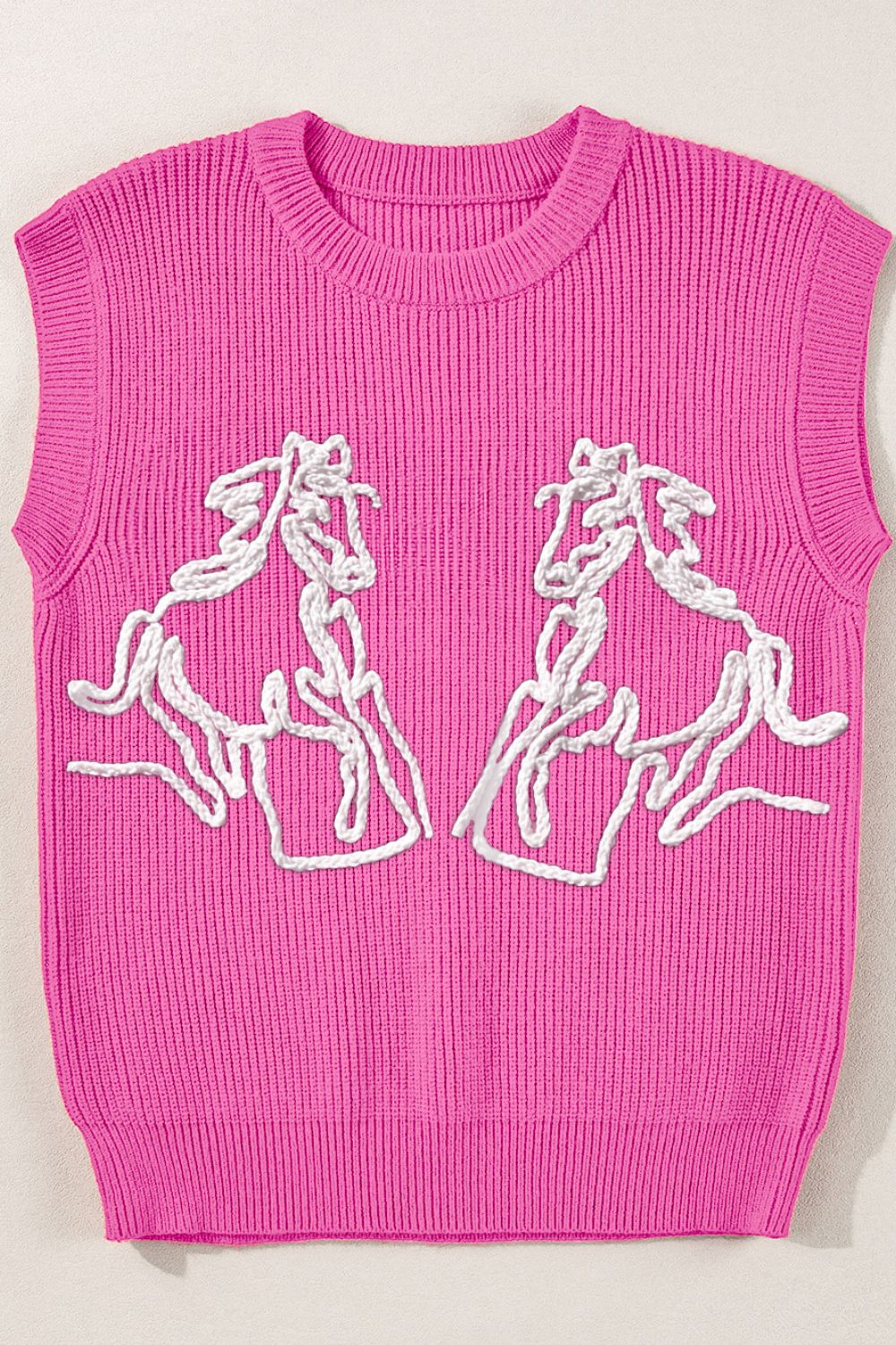 Fuchsia pink ribbed knit vest with white embroidered horse design.