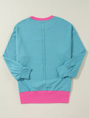 Colorblock Patchwork Crew Neck Sweatshirt in Teal, close-up detail