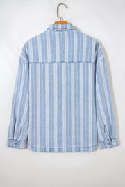 Relaxed fit denim shacket with vertical stripes, button-down front, and chest pockets.