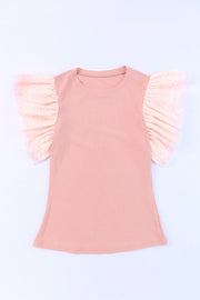 Blush pink ribbed knit blouse with sheer polka dot ruffle sleeves