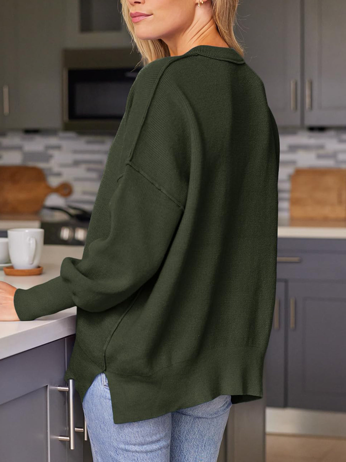 Ribbed-knit relaxed fit sweater in Army Green with a collar detail and split hem.