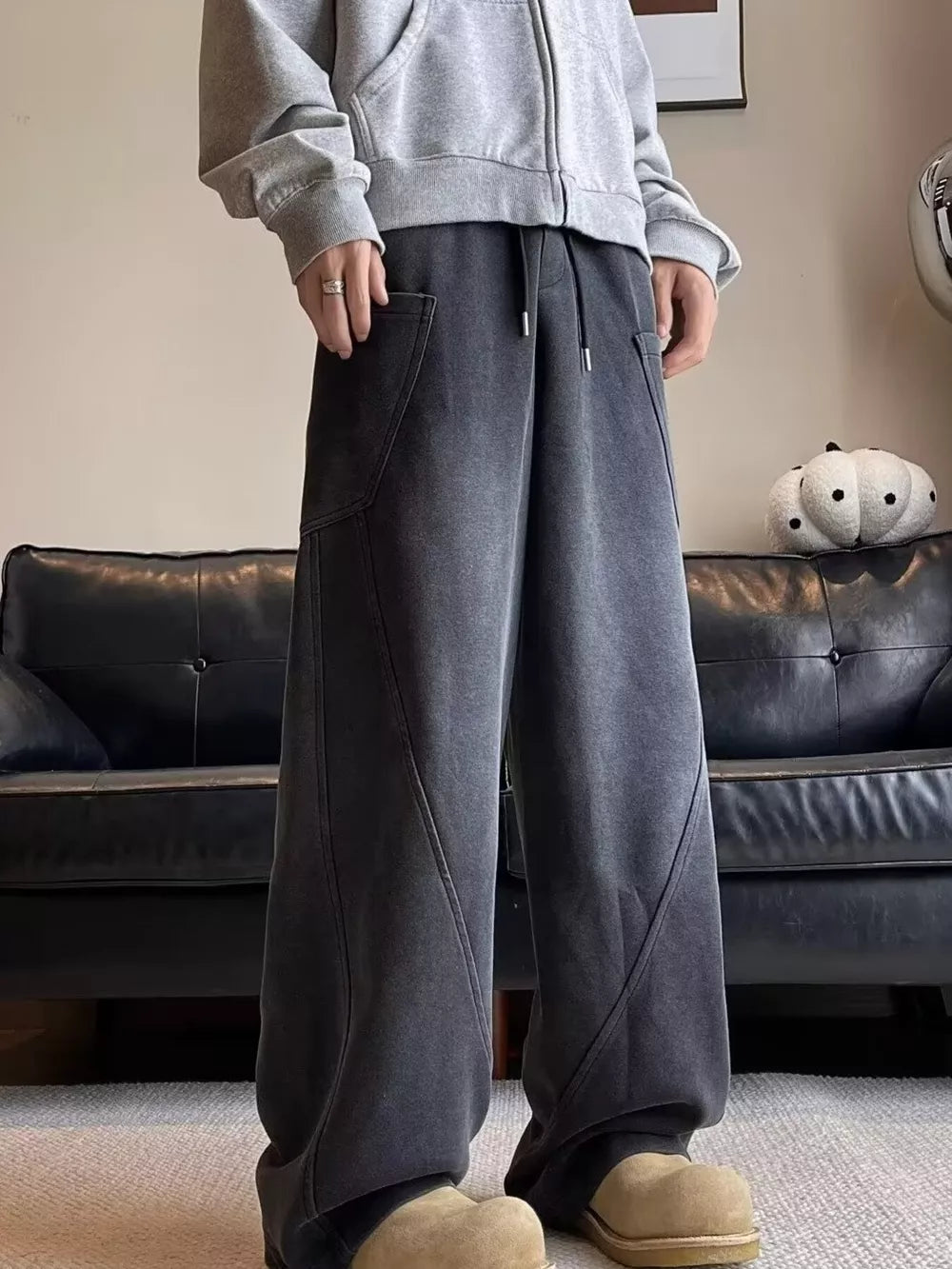 Men's charcoal relaxed fit sweatpants with drawstring and pockets.