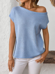 Light blue off-the-shoulder knit tee with short sleeves and a boat neckline.