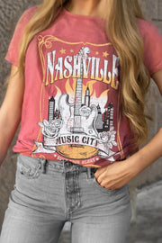 Burnt coral graphic t-shirt with Nashville Music City guitar and city skyline print.