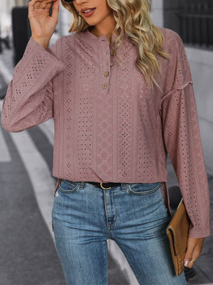 Dusty pink perforated henley shirt with slit hem and button detail.