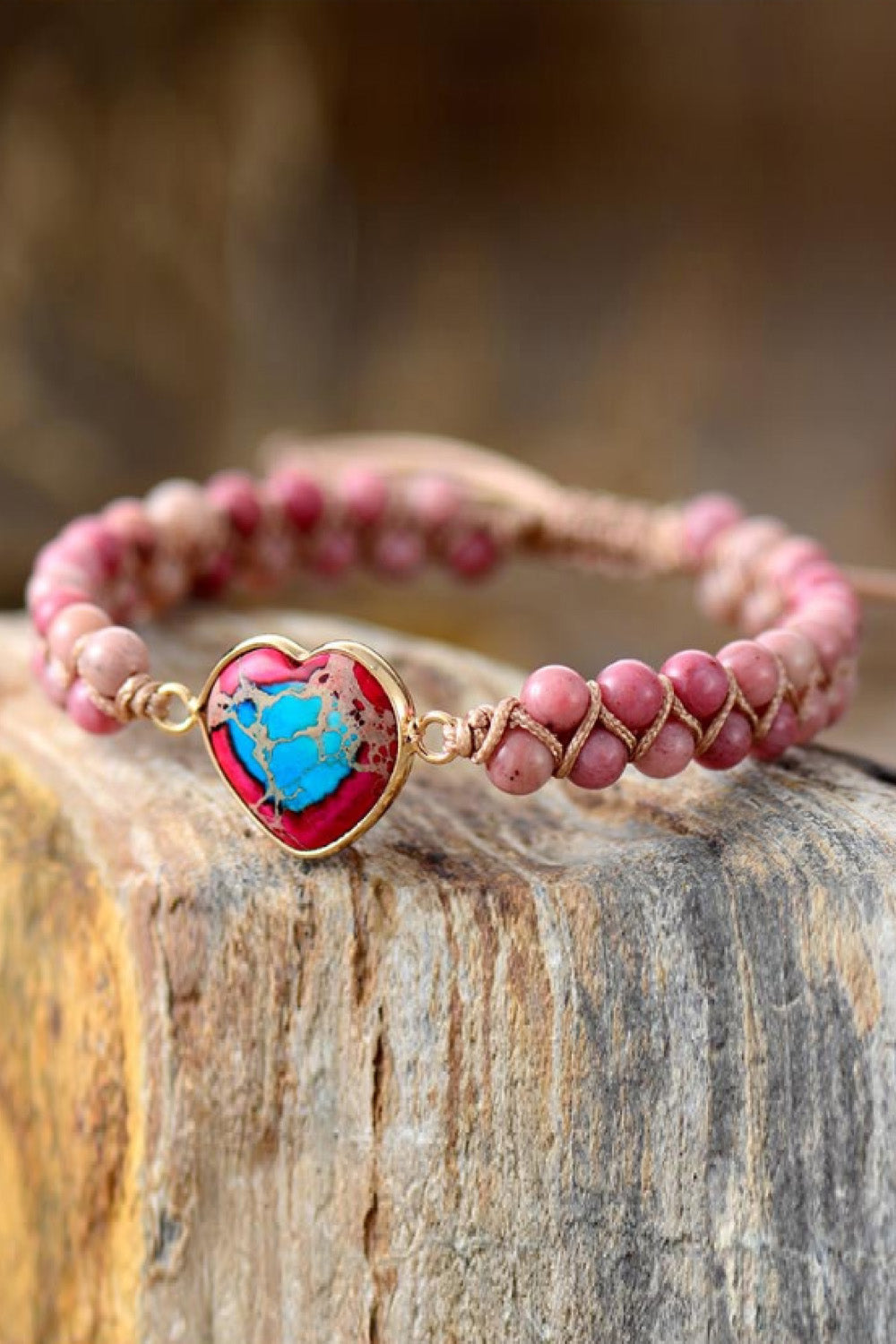 Heart stone beaded bracelet with pink stones and a multicolor heart stone charm.