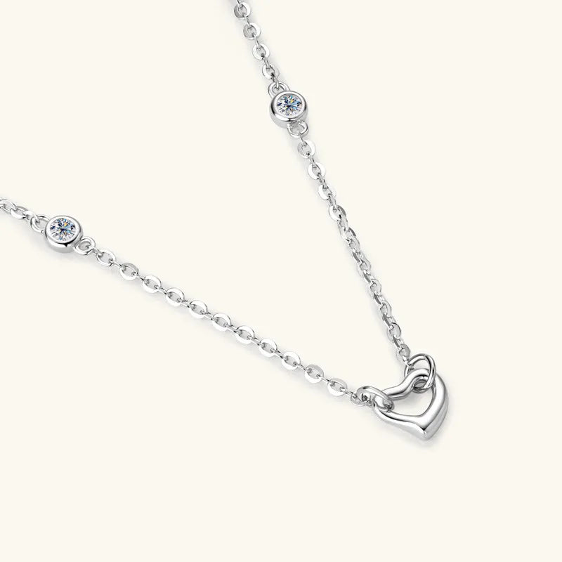 Silver linked heart pendant necklace with bezel-set accent stones