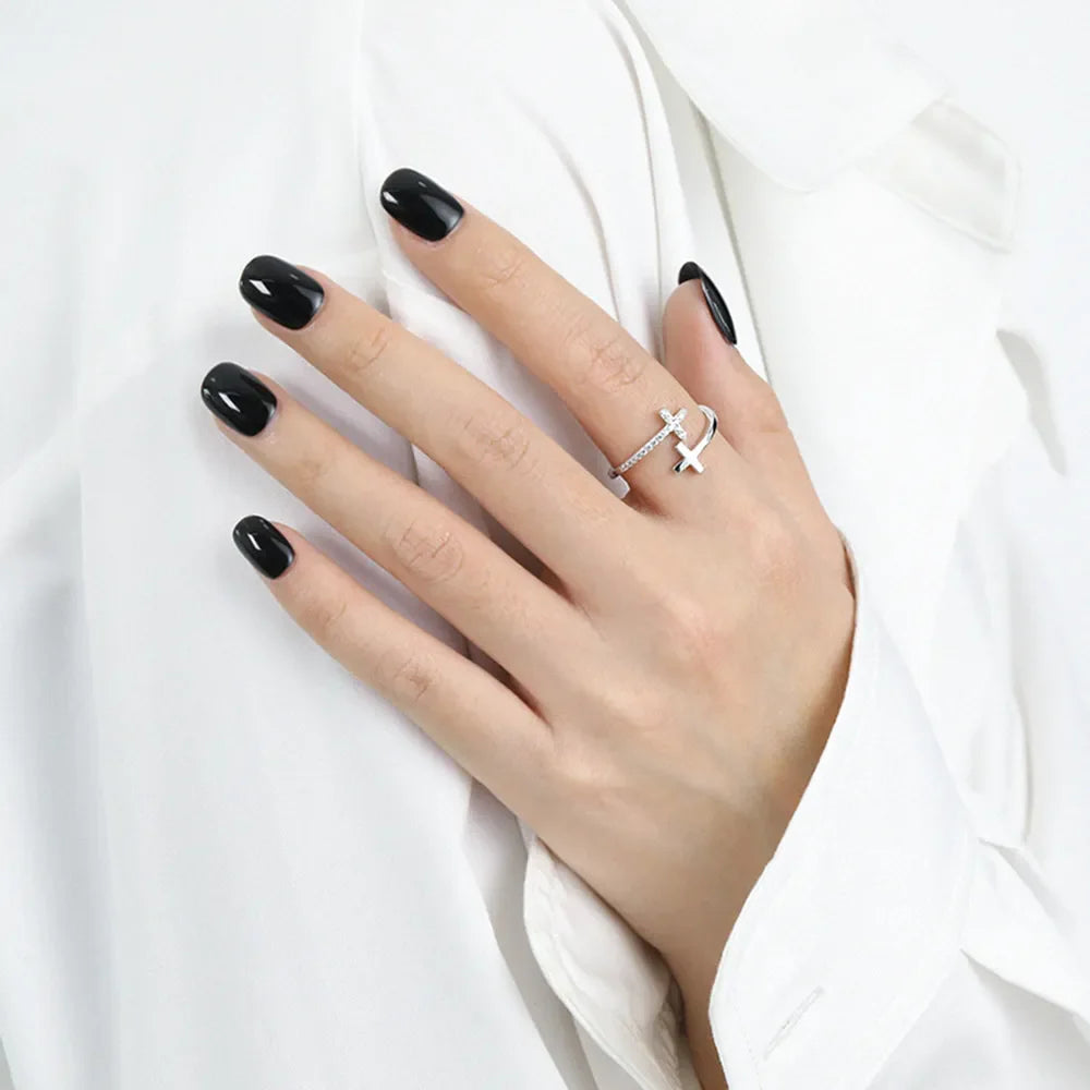 Silver sterling silver ring with crossed double cross design