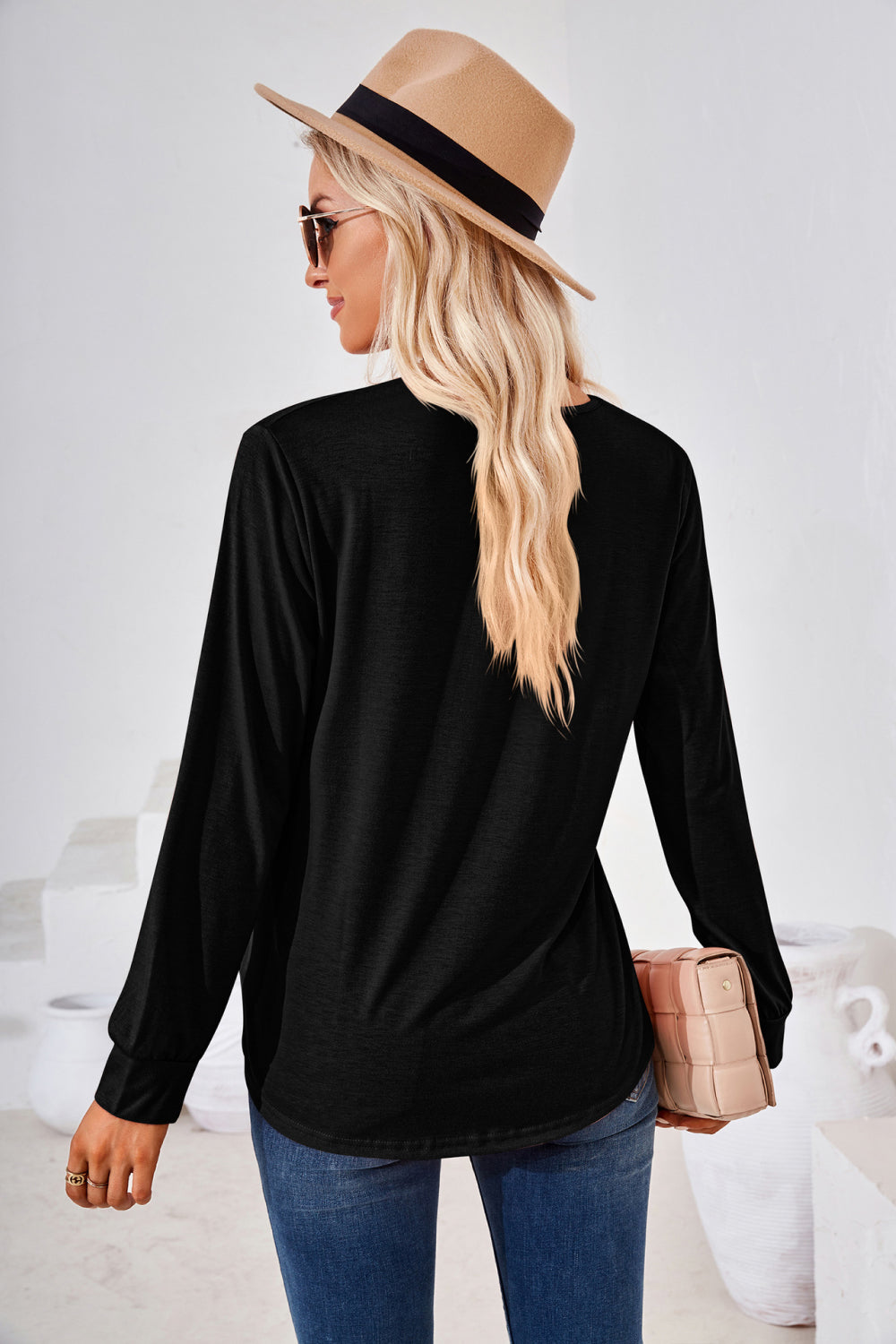 Black long sleeve jersey top with gathered square neckline