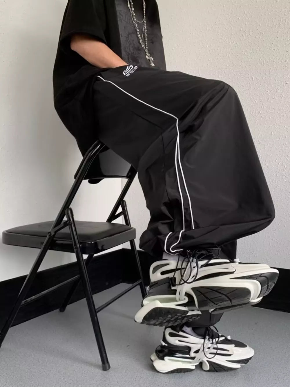 Men's Striped Wide Leg Pants in Black, back view