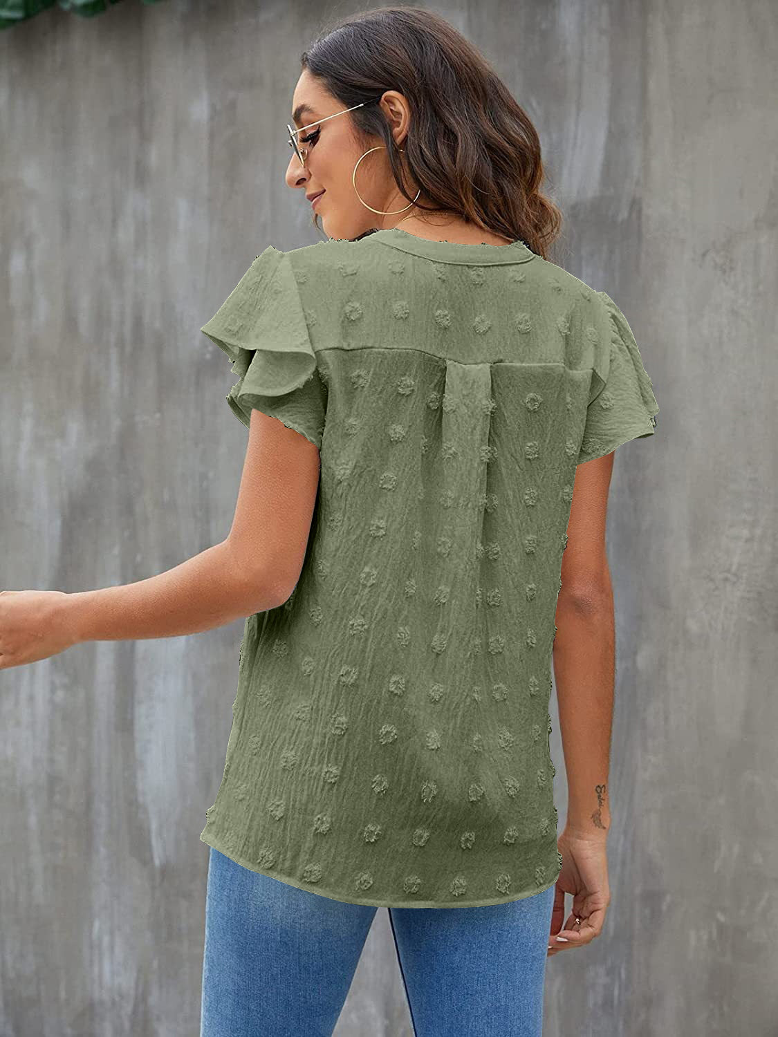Textured voile blouse in sage with flutter sleeves and dot pattern.