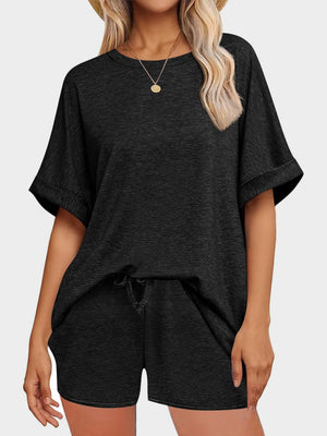 Black relaxed fit tee and shorts loungewear set with drawstring shorts.
