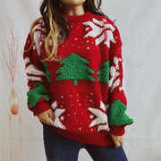 Red acrylic knit sweater with festive Christmas tree and snowflake appliqués.
