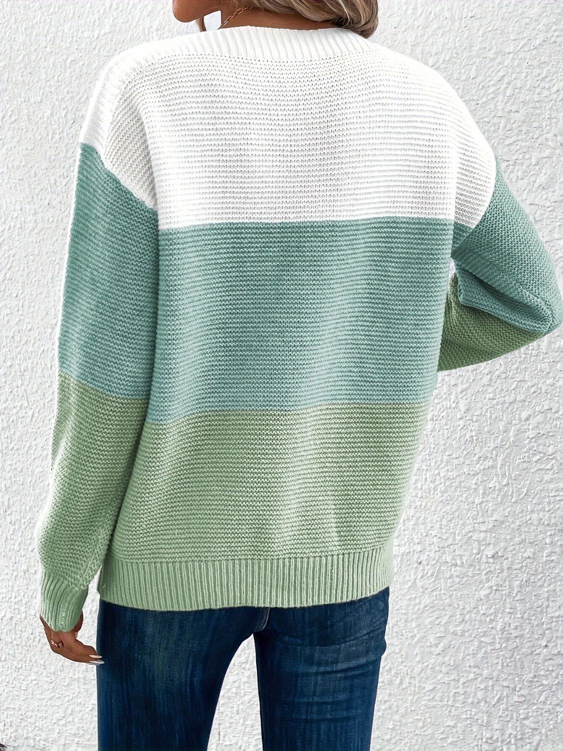 Colorblock ribbed knit sweater with boatneck in white, light blue, and gum leaf green.