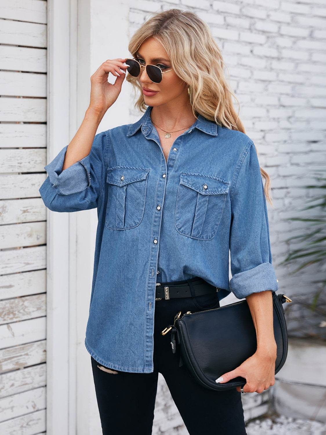 Oversized Dusty Blue denim utility shirt with button-down front and two chest pockets.