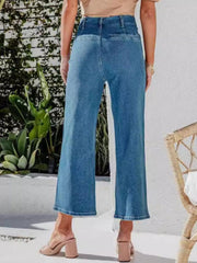 Button-front wide-leg cropped jeans in light blue denim, showing the back view.