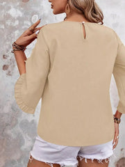 Apricot ruffled sleeve blouse with button detail and keyhole back.