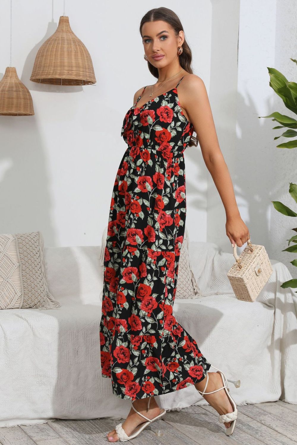 Floral print maxi dress with ruffle detail and tiered skirt.