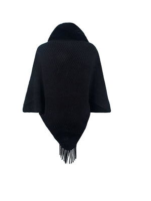 Black textured knit poncho with faux fur collar and fringe hem