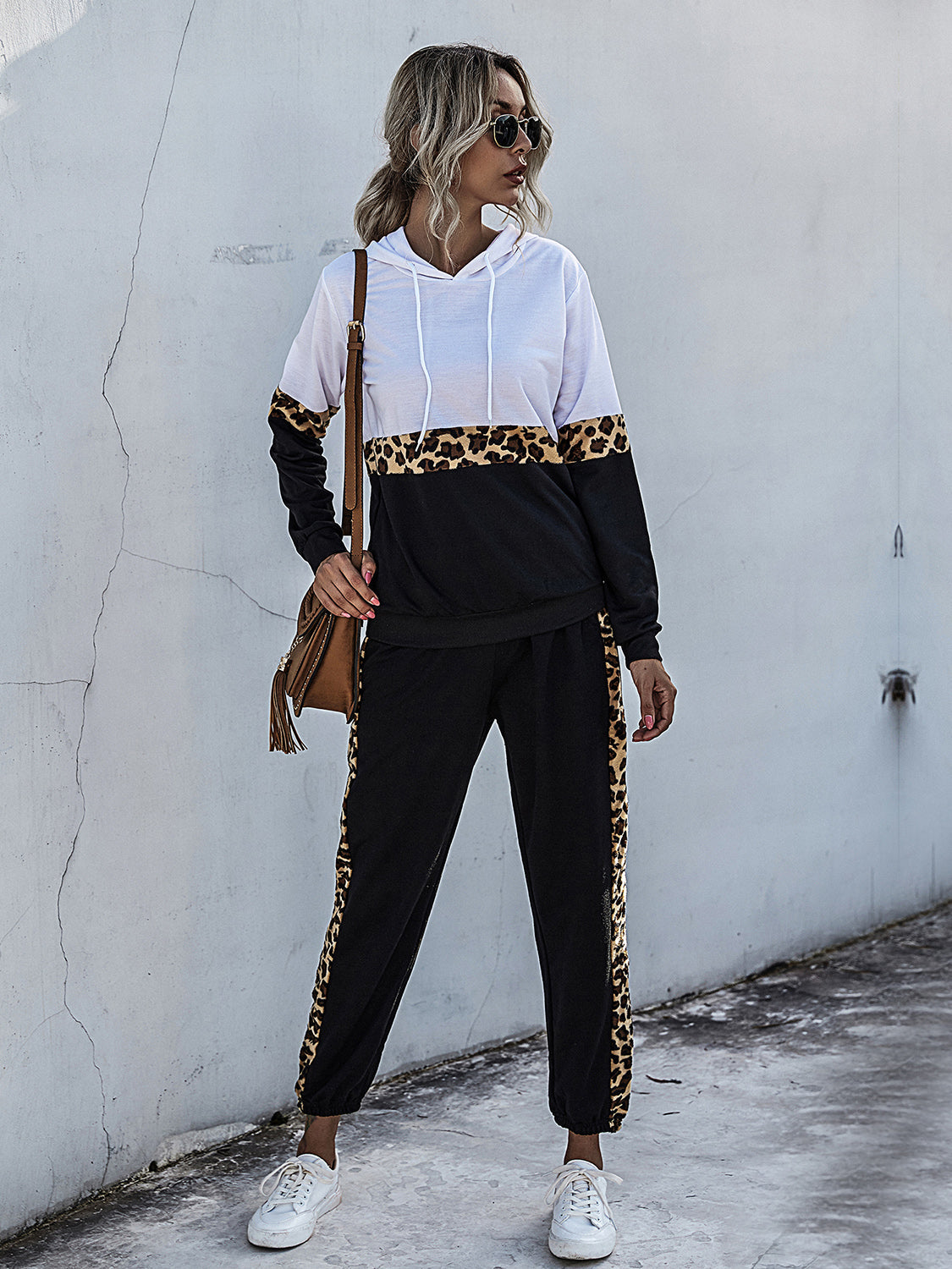Leopard trim colorblock loungewear set in white and black with a hooded top and joggers.