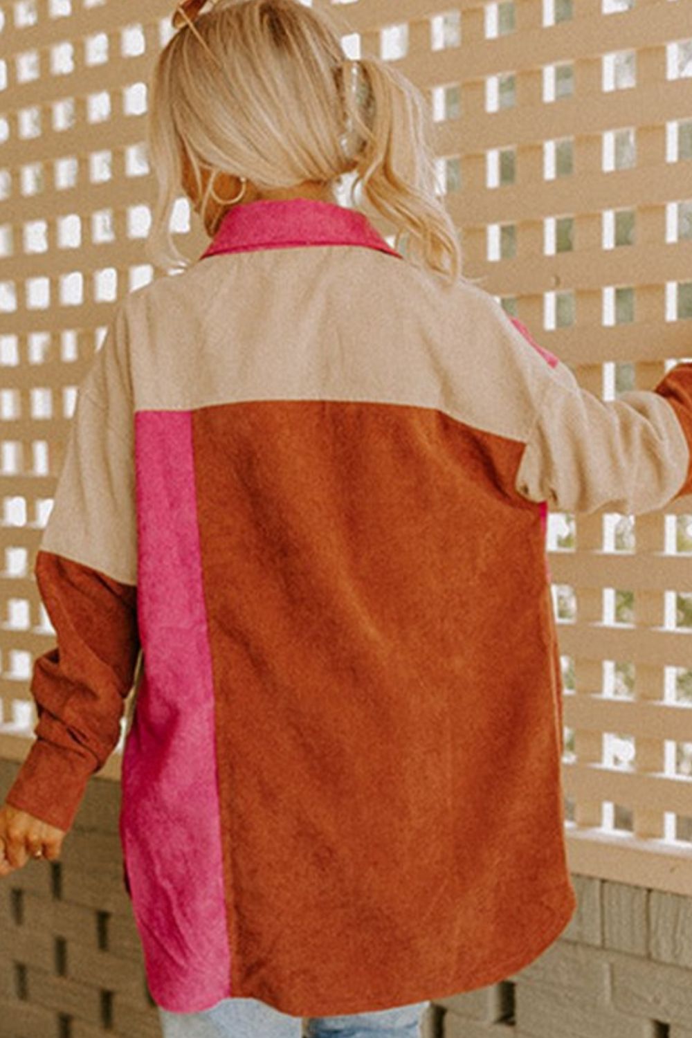 Oversized corduroy shacket with colorblock detail in tan, brown, and hot pink.