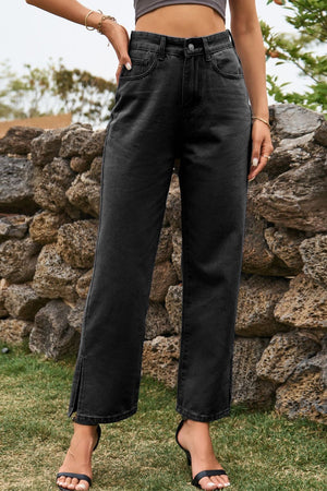 Dark wash split hem straight leg jeans with a cropped length.